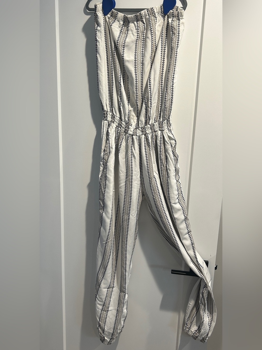 White strapless jumpsuit with side pockets